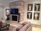 Mahogany Wood - Black Soapstone - Yellow Calcite mounted on black marble base (right side of Fireplace)